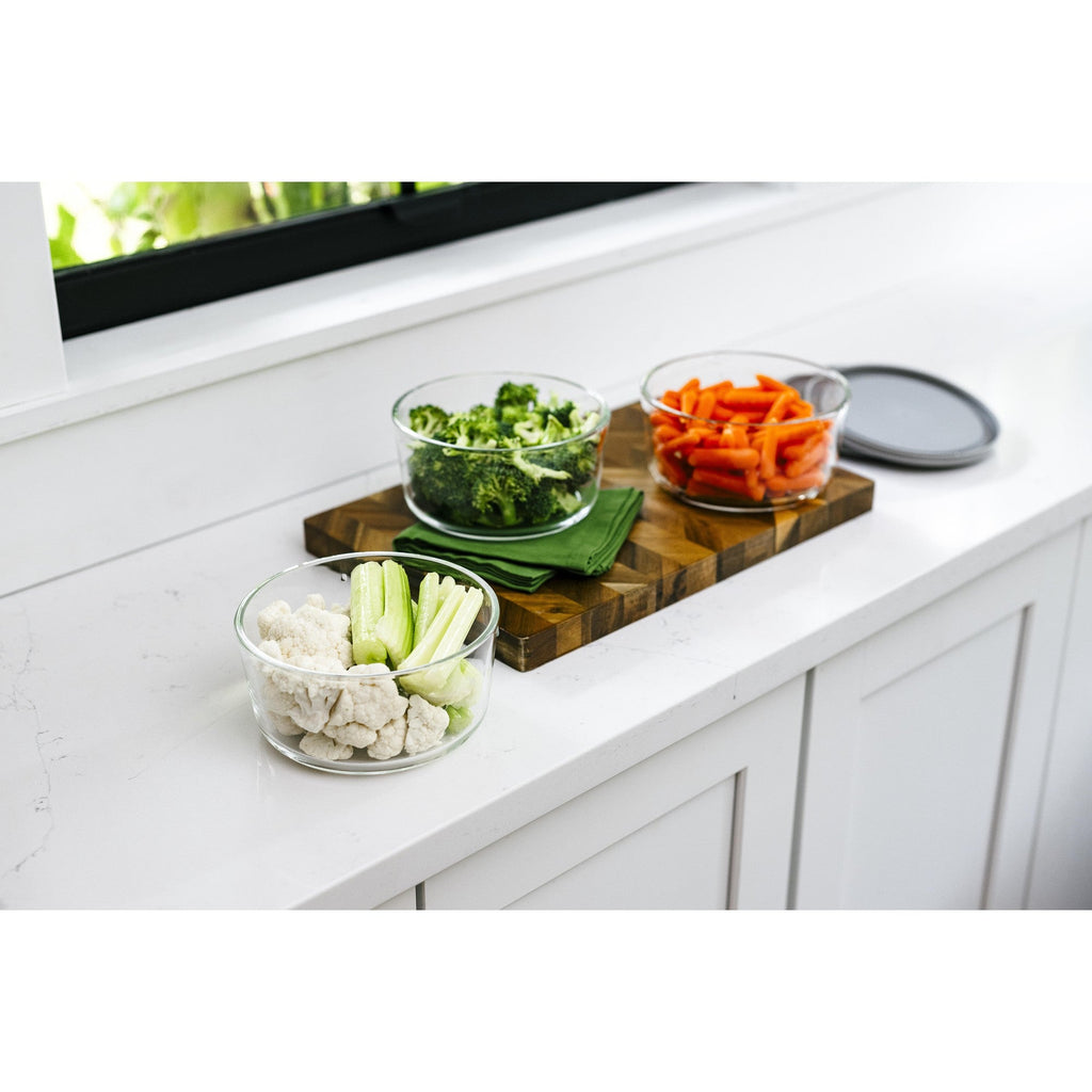 Six round borosilicate glass food storage containers with airtight grey lids for meal prep — view 4