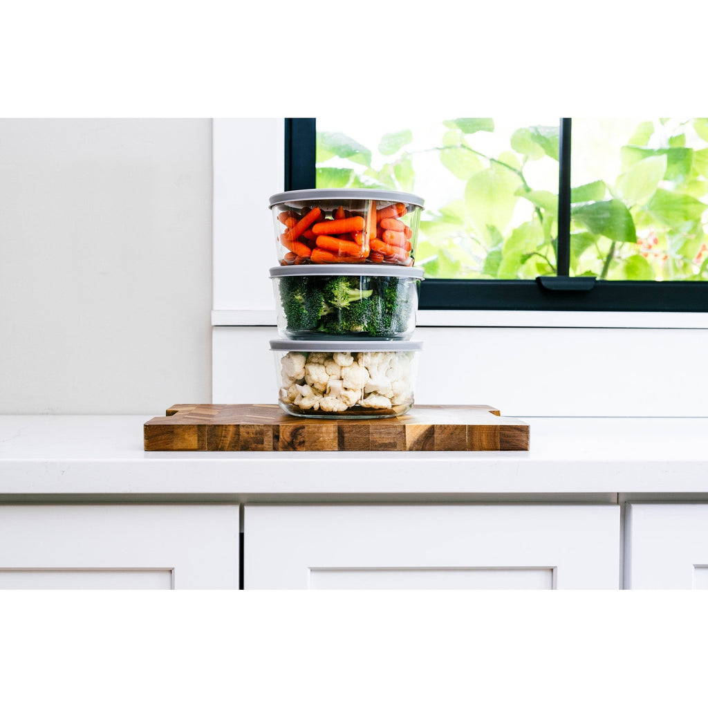 Six round borosilicate glass food storage containers with airtight grey lids for meal prep — view 5