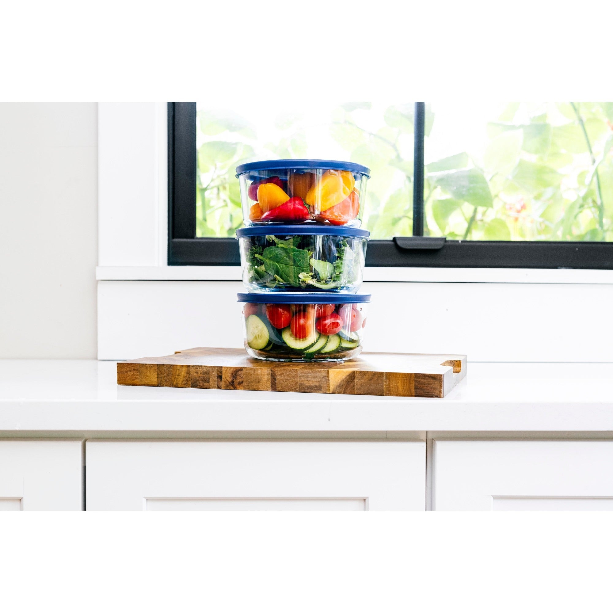 Six piece round glass storage container set with blue airtight lids for meal preparation — view 5