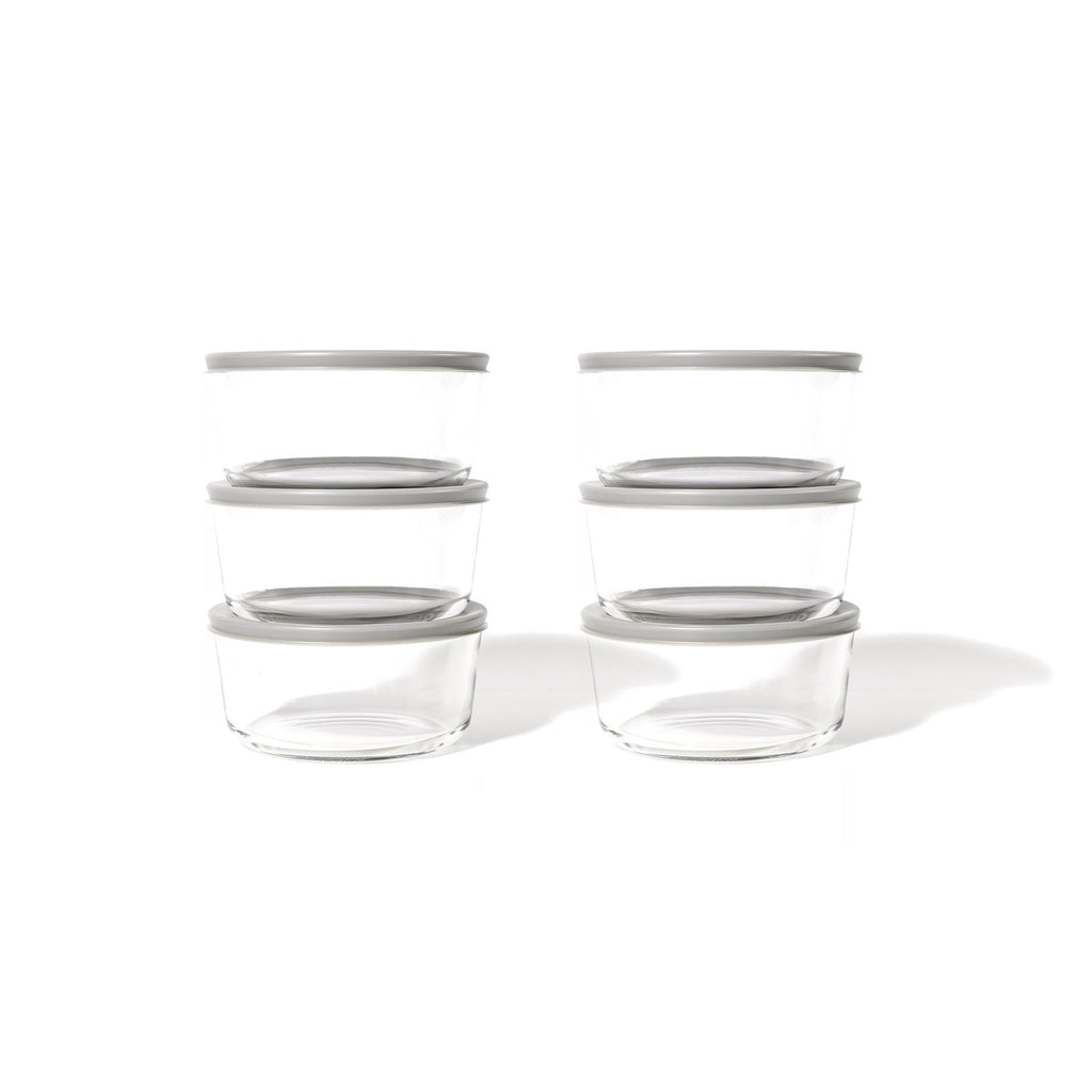 12 piece round glass food storage containers with grey airtight lids on kitchen counter — view 3