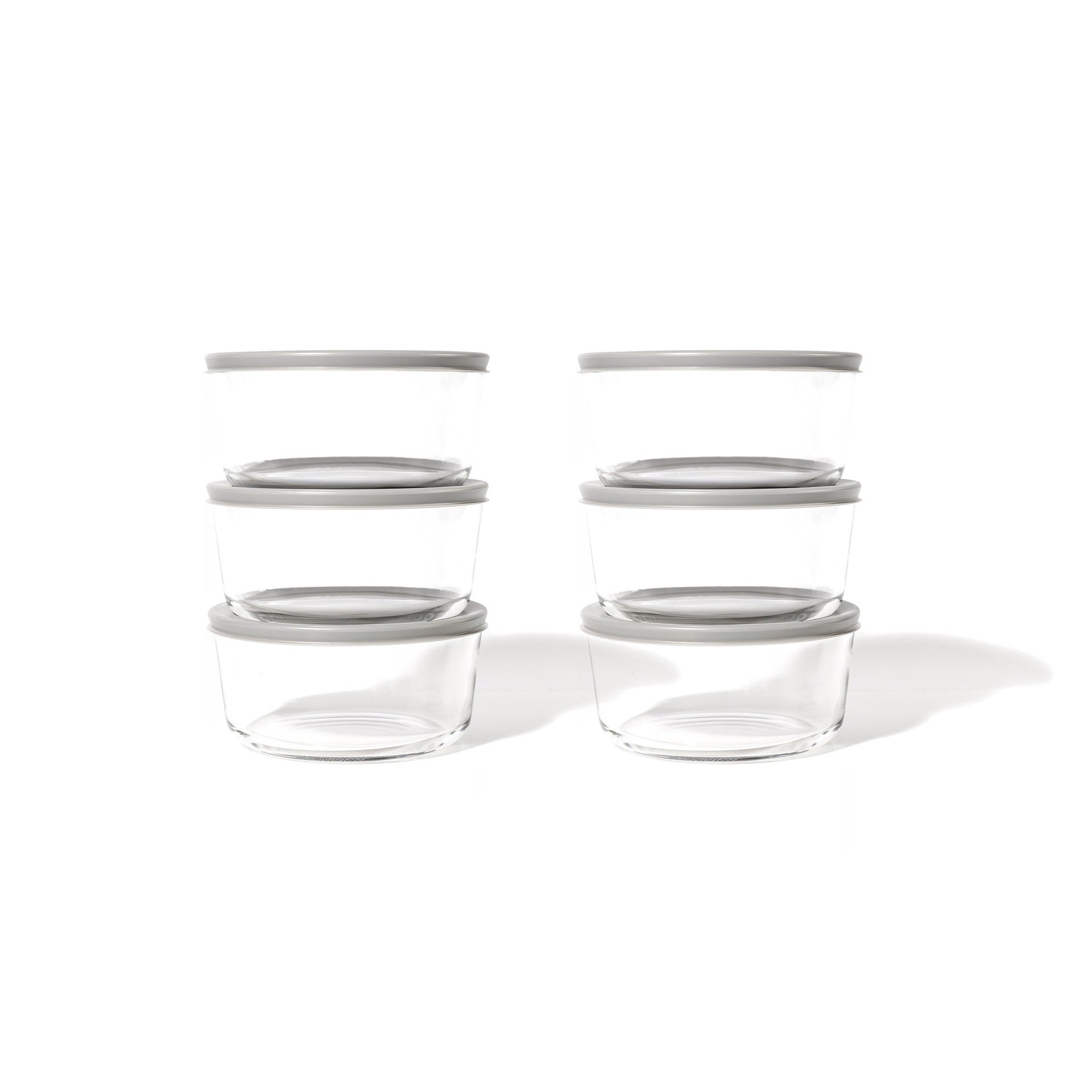 12 piece round glass food storage containers with grey airtight lids on kitchen counter — view 3