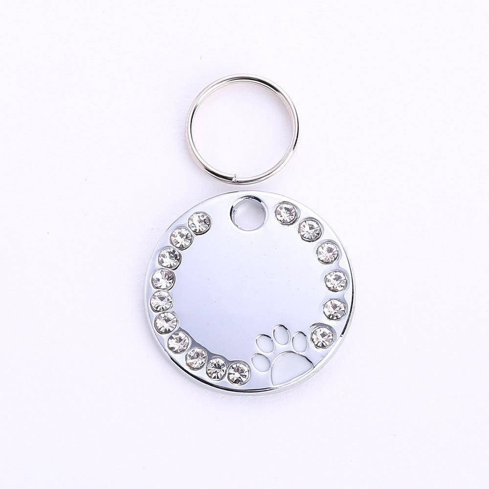 Personalized round metal dog tag keychain with custom engraving for pet owners and animal lovers — view 2