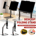 Adjustable carbon steel folding phone and tablet stand positioned upright for a home office desk setup