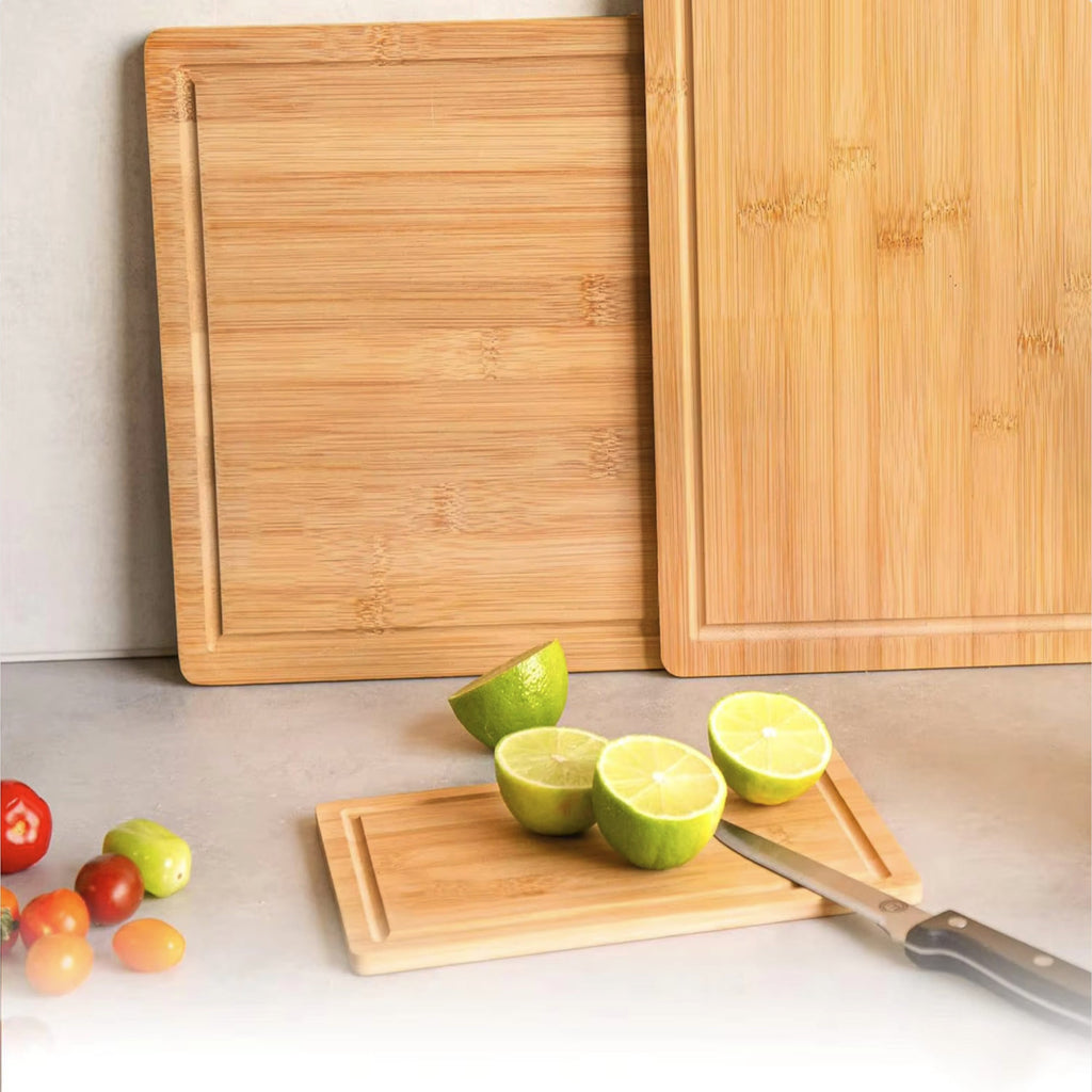 Three piece natural bamboo and acacia wood cutting board set in large medium and compact sizes — view 3