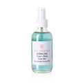 Coraline hydrating face, hair, and body mist spray bottle with floral botanical ingredients