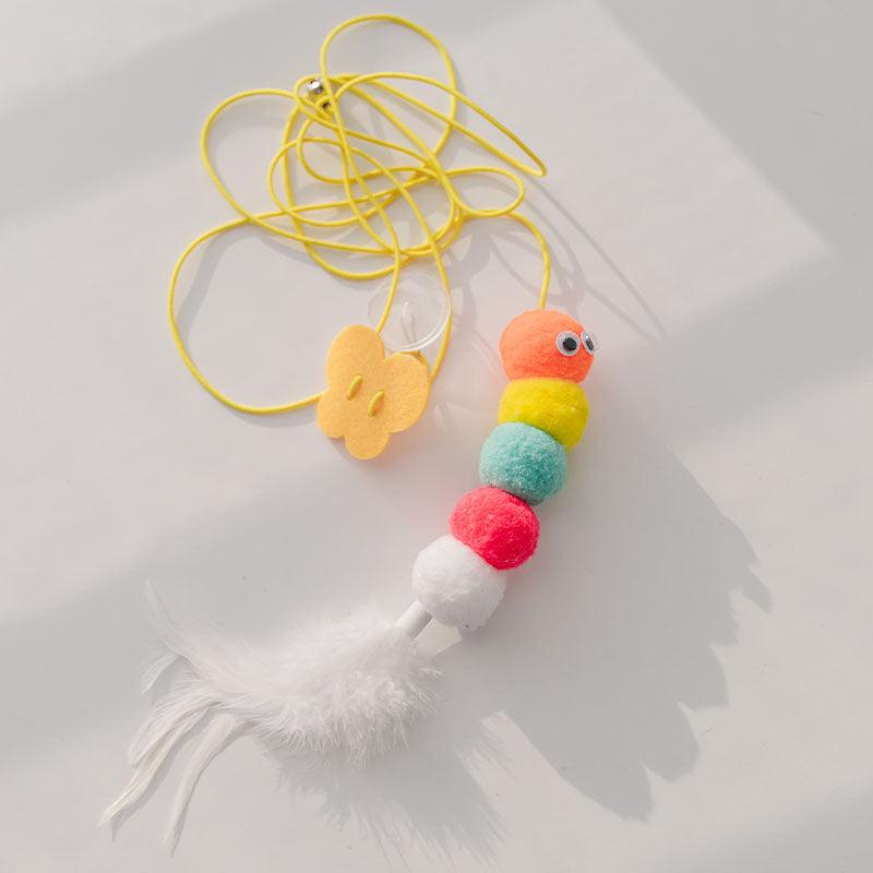 Interactive swing cat toy with bouncing polyester ball, elastic rope, and natural feather attachments — view 3