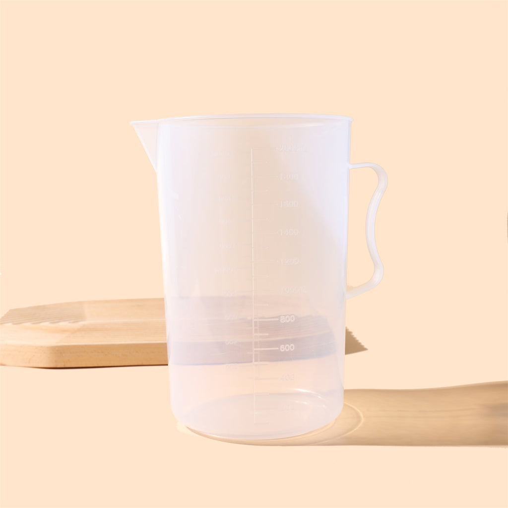 Large 2000ml clear measuring cup with graduation marks and pouring spout for baking and crafting — view 2