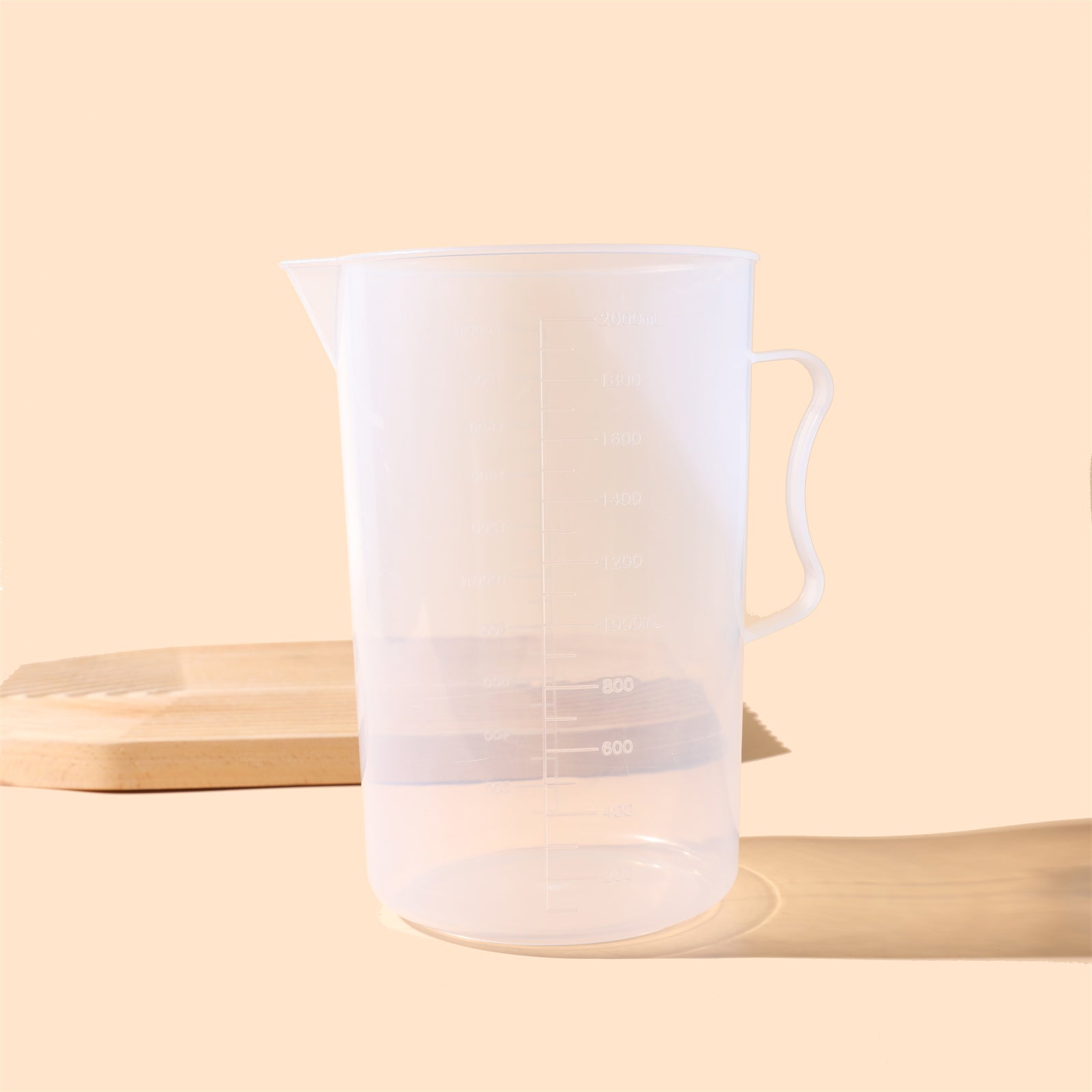 Large 2000ml clear measuring cup with graduation marks and pouring spout for baking and crafting — view 2