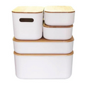 Plastic and bamboo storage container in off-white with natural wood lid and side handles