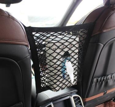 Black polyester universal car seat storage net and pet barrier suspended between two front seats — view 3
