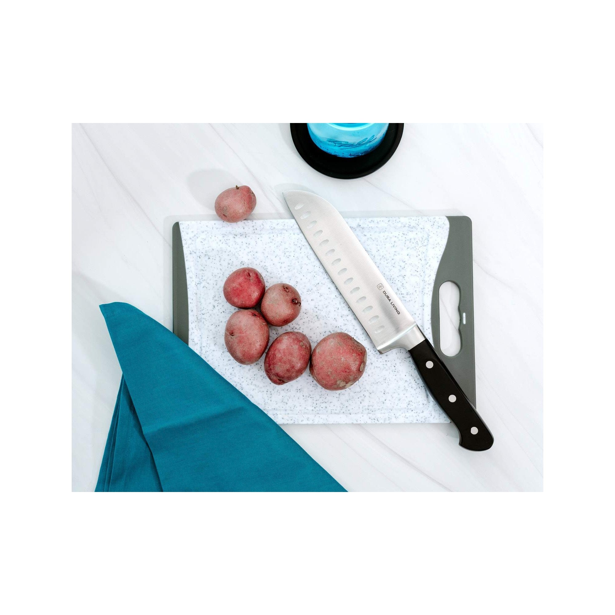 4-piece kitchen knife set with black ergonomic handles and German steel blades with protective guards — view 4