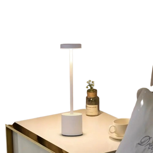 Minimalist wireless touch table lamp in polished aluminum on a bedside table — view 2