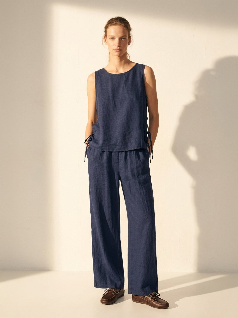 Elegant women's blue pure linen trousers featuring expertly tailored seams and a lightweight, relaxed fit — view 2