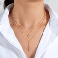 Double layer chain necklace with round charm and bar drop pendant for party and everyday wear