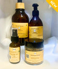 Four piece Iteru hair care set in amber bottles with bamboo nozzles and natural scrub