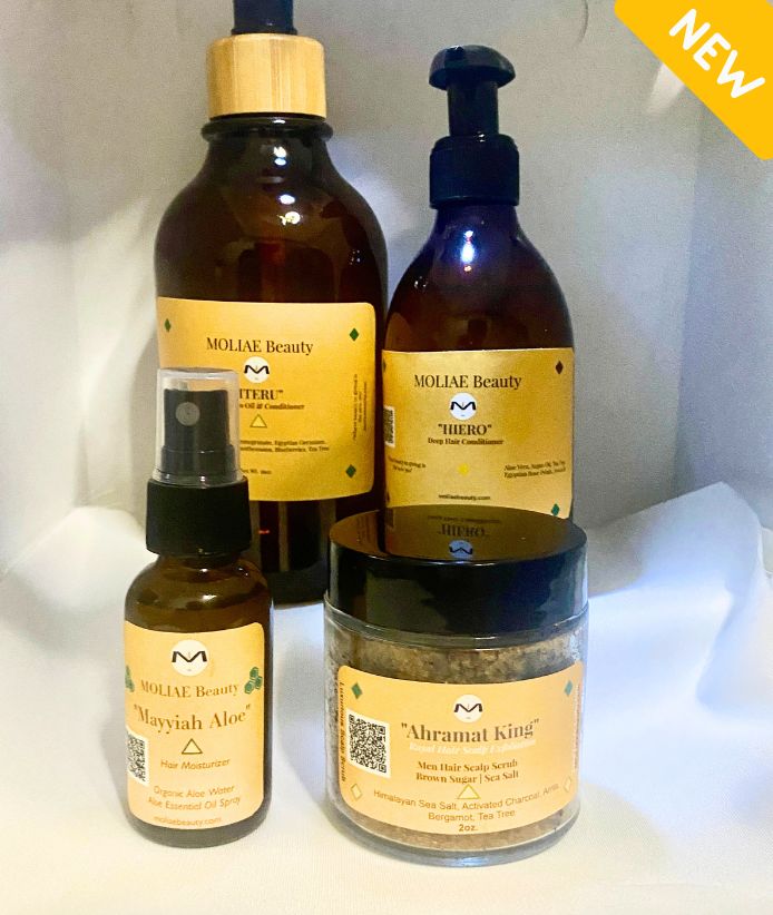 Four piece Iteru hair care set in amber bottles with bamboo nozzles and natural scrub