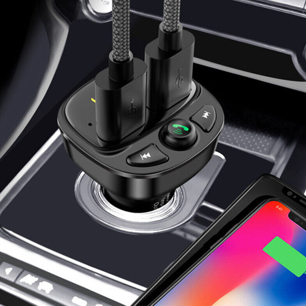 Black wireless car FM transmitter and dual USB phone charger plugged into vehicle socket. — view 3