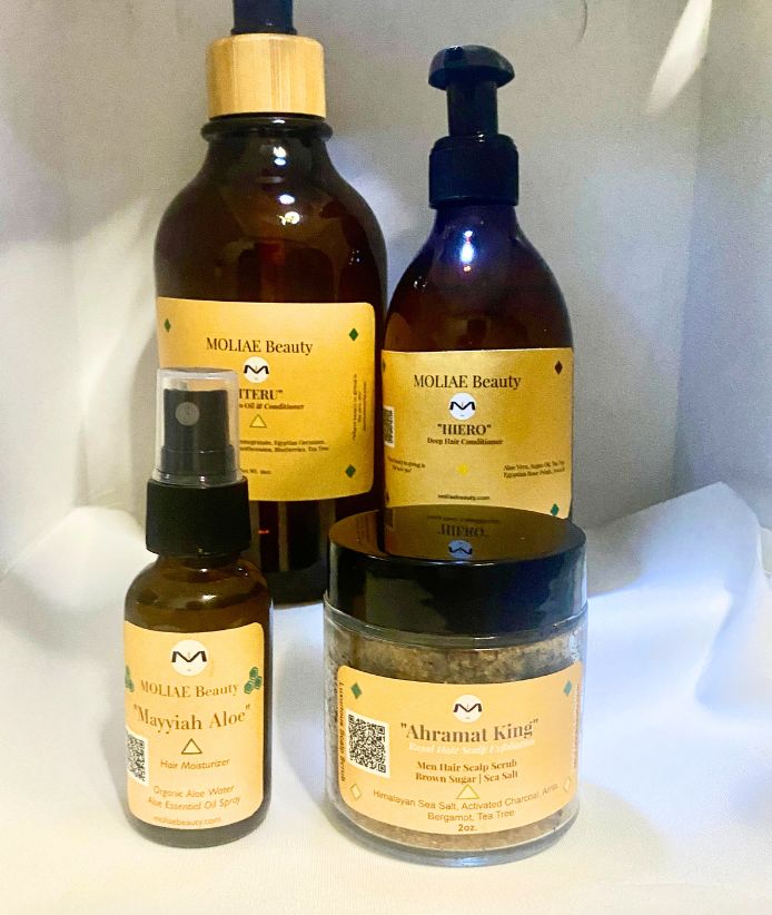 Four piece Iteru hair care set in amber bottles with bamboo nozzles and natural scrub — view 2