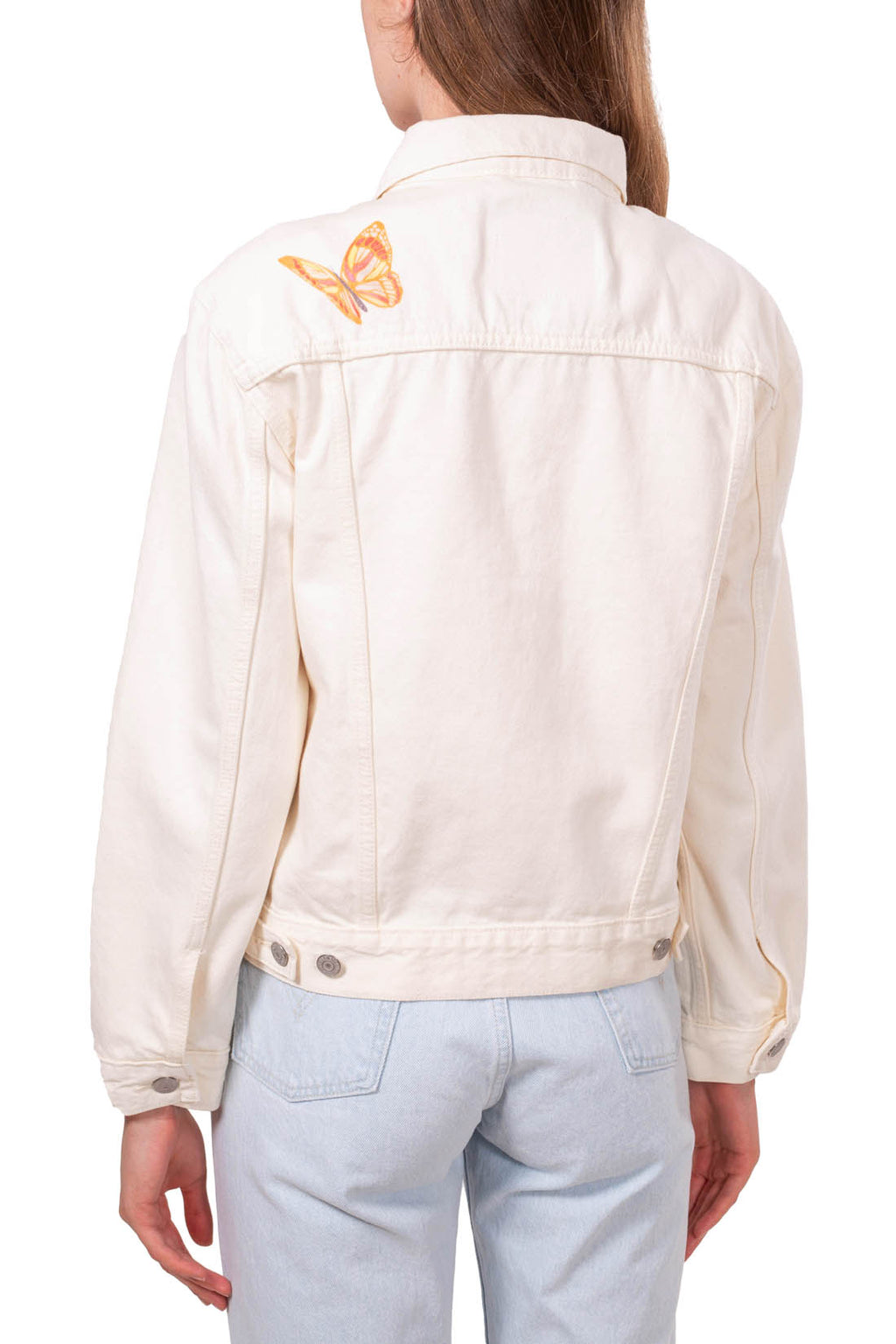 Cream white women's denim jacket featuring a contrasting butterfly graphic print and front button fastening — view 7