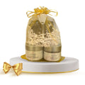 Organic face mask gift set with two masks, soft white spa headband, and applicator brush