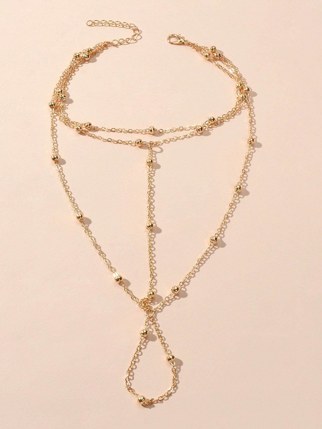 Gold chain boho layered anklet with toe ring attachment, elegant barefoot sandal foot jewellery. — view 2