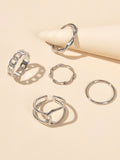 Set of five minimalist stackable midi finger rings in trendy gold and silver finishes