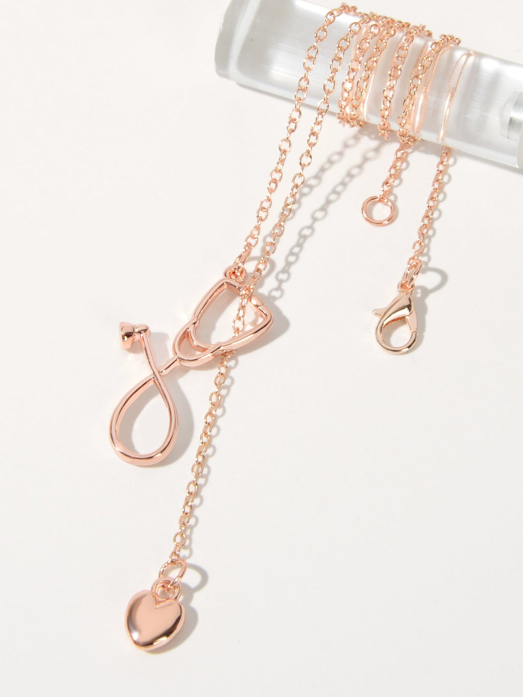 Minimalist gold and silver stethoscope heart pendant Y-shape necklace on a delicate chain