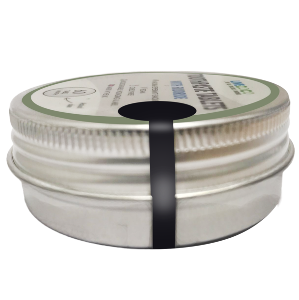 Fresh peppermint toothpaste tablets in a reusable tin container for zero waste oral care — view 3