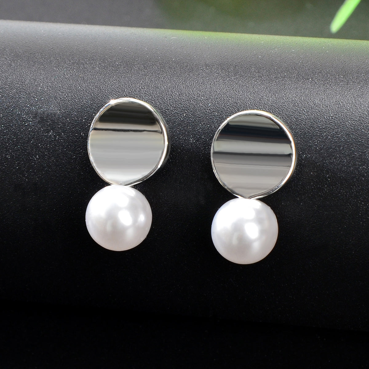 Dainty round gold metal faux pearl stud earrings for daily wear and elegant occasions. — view 4