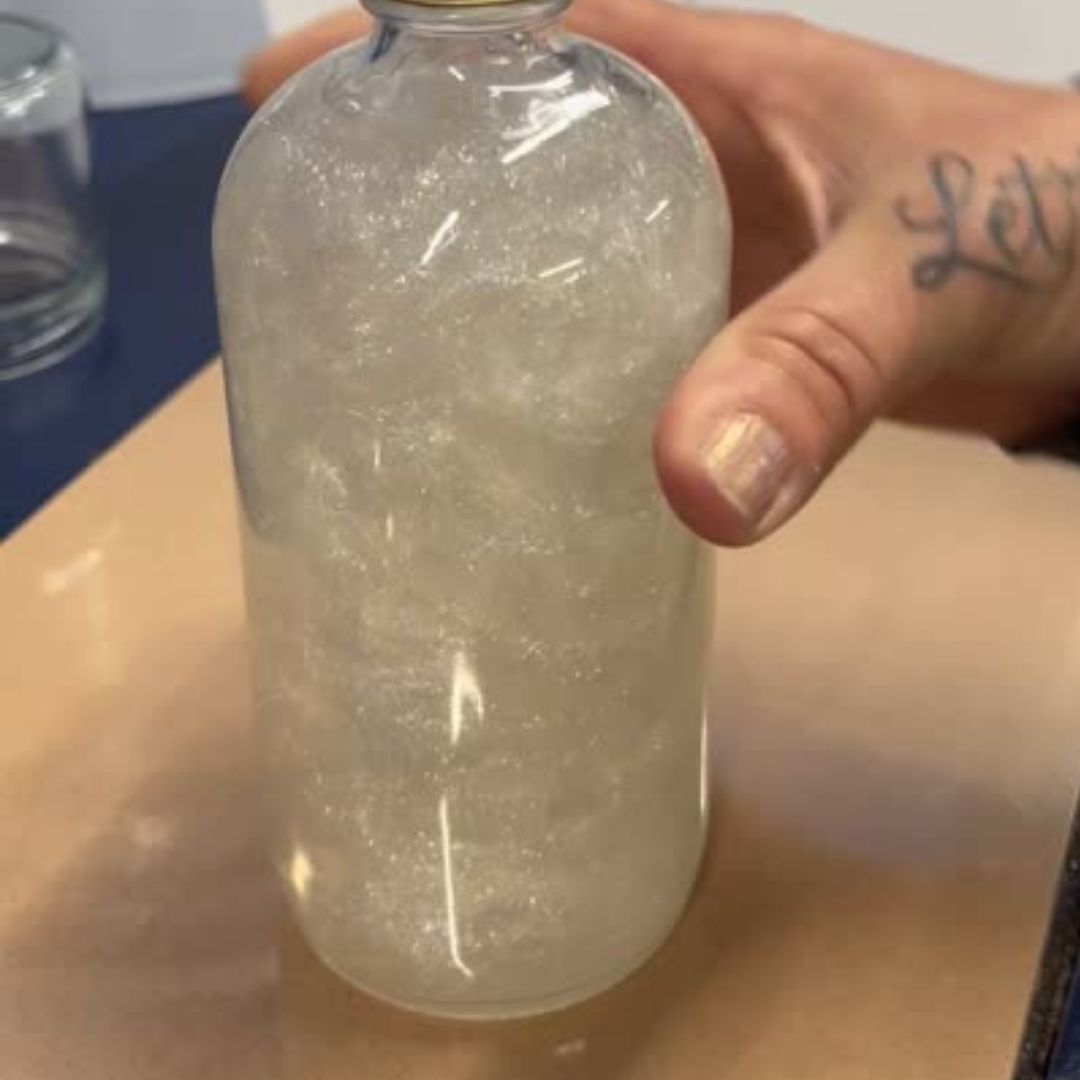 Glitter simple syrup in a sixteen ounce bottle, shimmering liquid for artisanal cocktails and mocktails — view 4