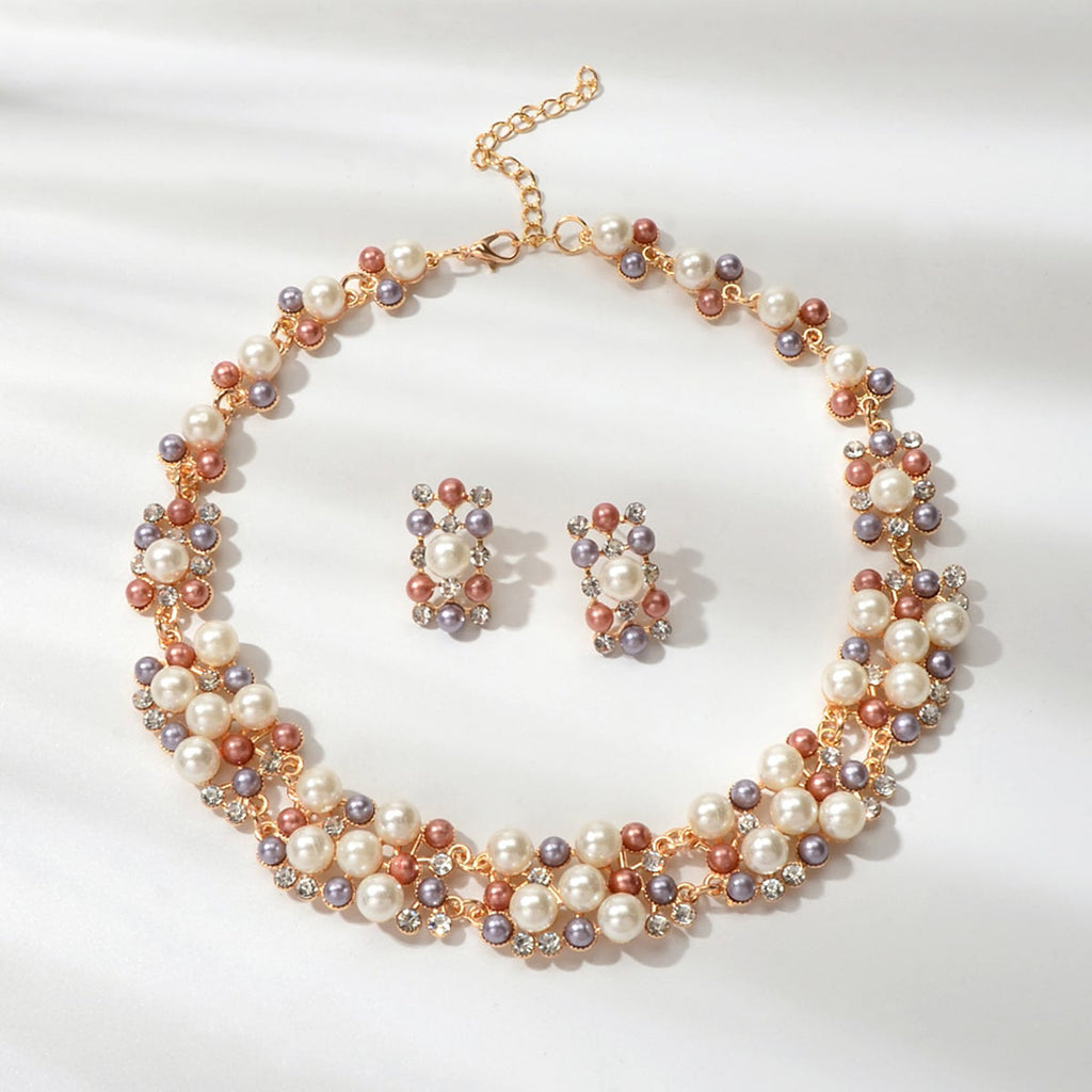 Luxurious rhinestone and pearl collar necklace with matching stud earrings set for formal engagement events.