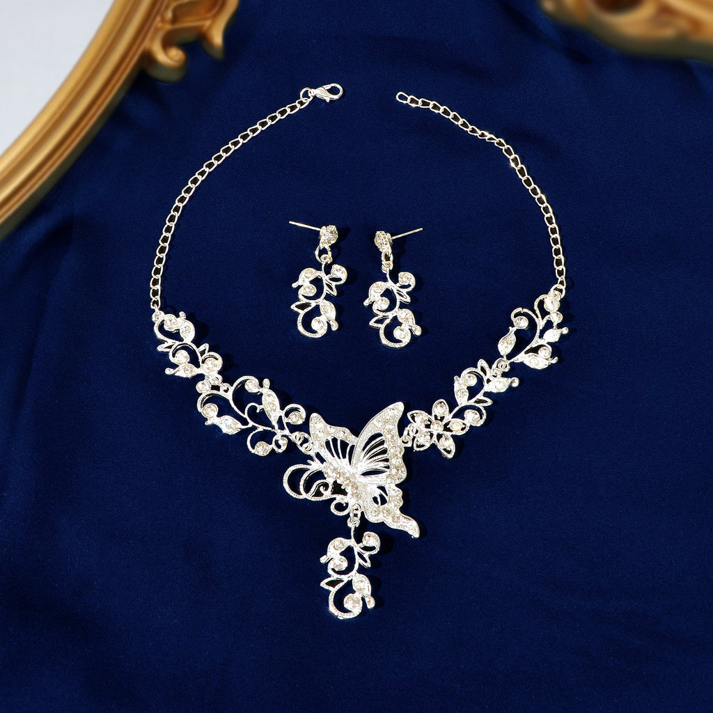 Silver-toned flower and butterfly collar necklace with matching drop earrings elegant anniversary jewelry set — view 4