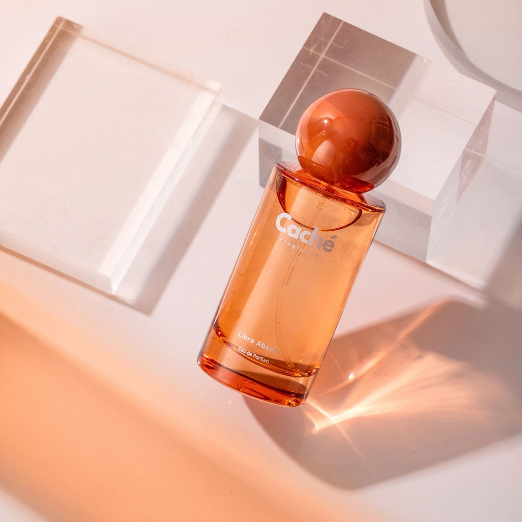Caché Libre Absolu women's floral Eau de Parfum glass bottle with golden accents. — view 3