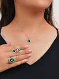Luxury three piece crystal floral wedding jewelry set with necklace, stud earrings, and matching finger ring