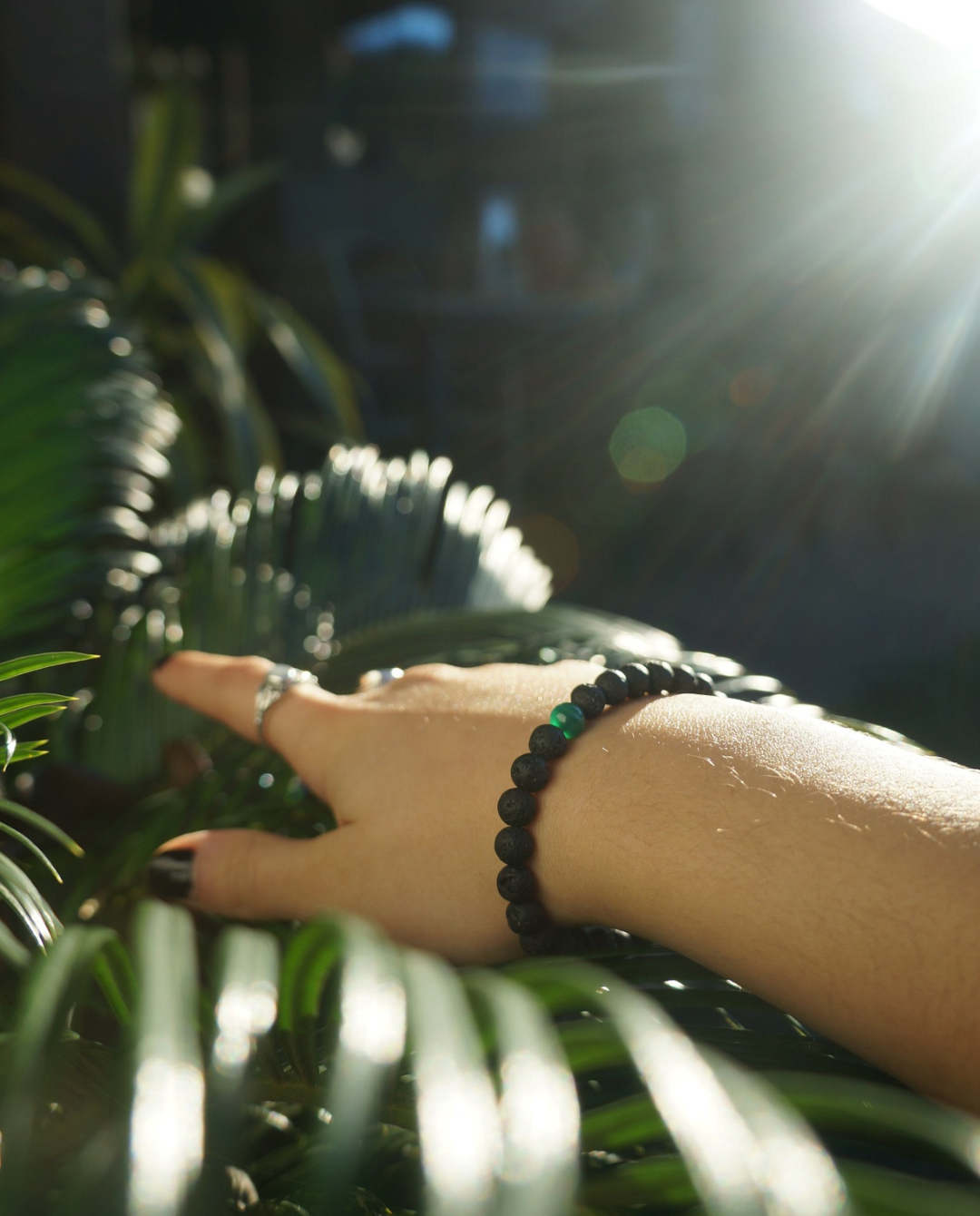 Earth Bracelet with black volcanic stone beads and a central agate gemstone for men and women — view 2