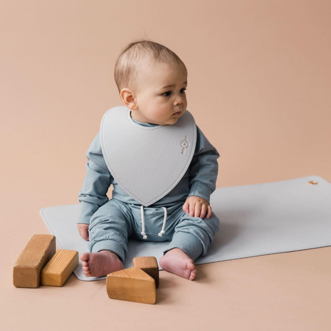 Ivory vegan leather changing mat laid flat, soft wipeable surface for baby diaper changes — view 5