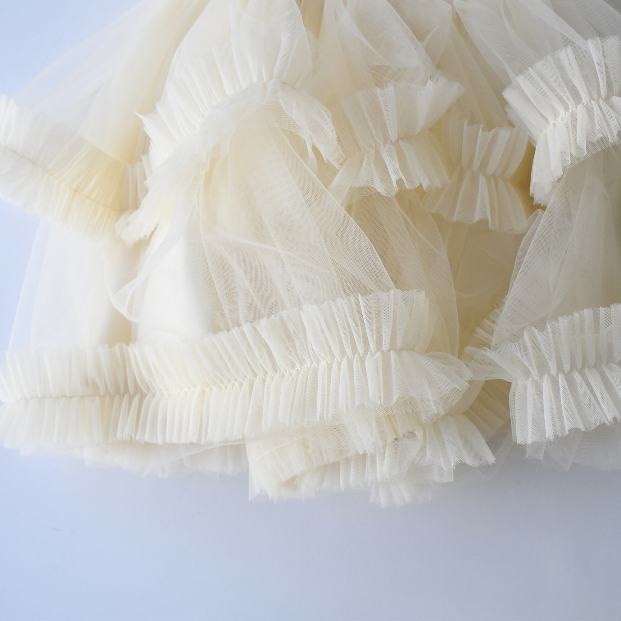 Feather Frida girls formal dress with satin bodice, feather waist, and layered tulle skirt — view 4