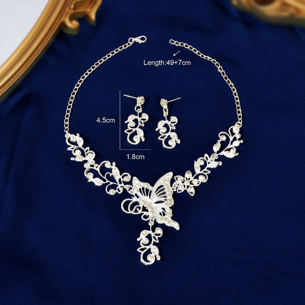 Silver-toned flower and butterfly collar necklace with matching drop earrings elegant anniversary jewelry set — view 5