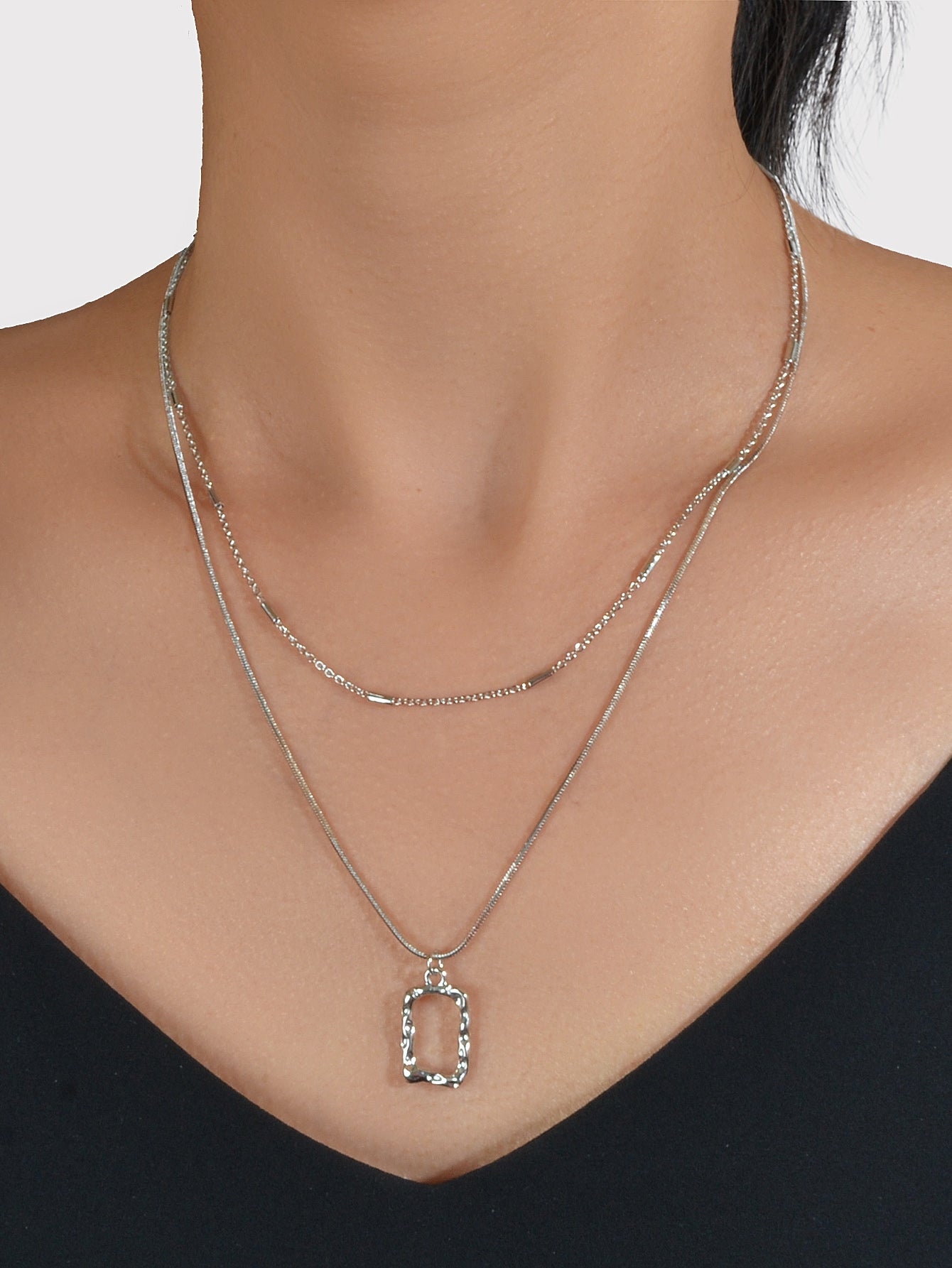 Minimalist square pendant layered necklace set with adjustable chain in metallic gold and silver finish — view 5
