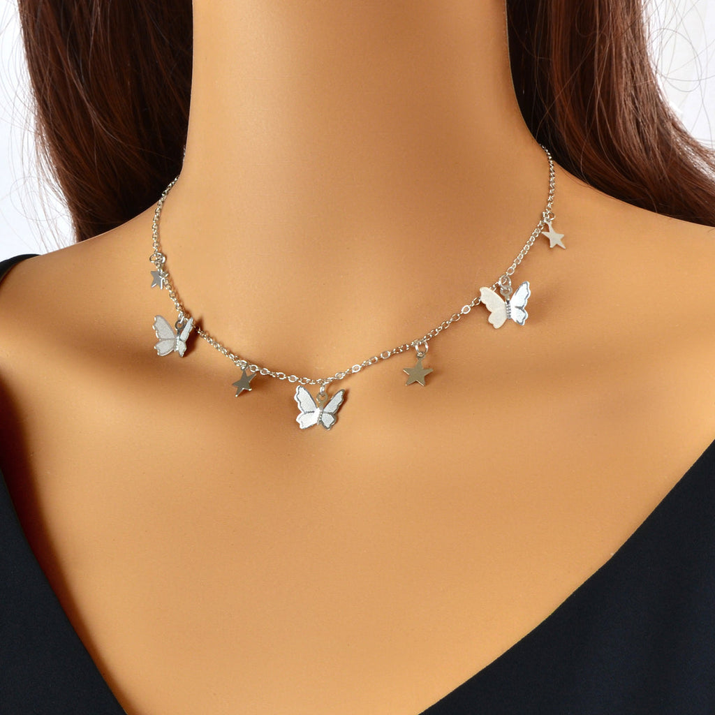 Gold chain collar necklace with delicate star and butterfly charms for women's party wear — view 5