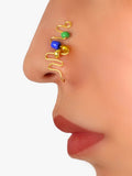 Faux spiral nose ring featuring blue and green beads for a bohemian non pierced look
