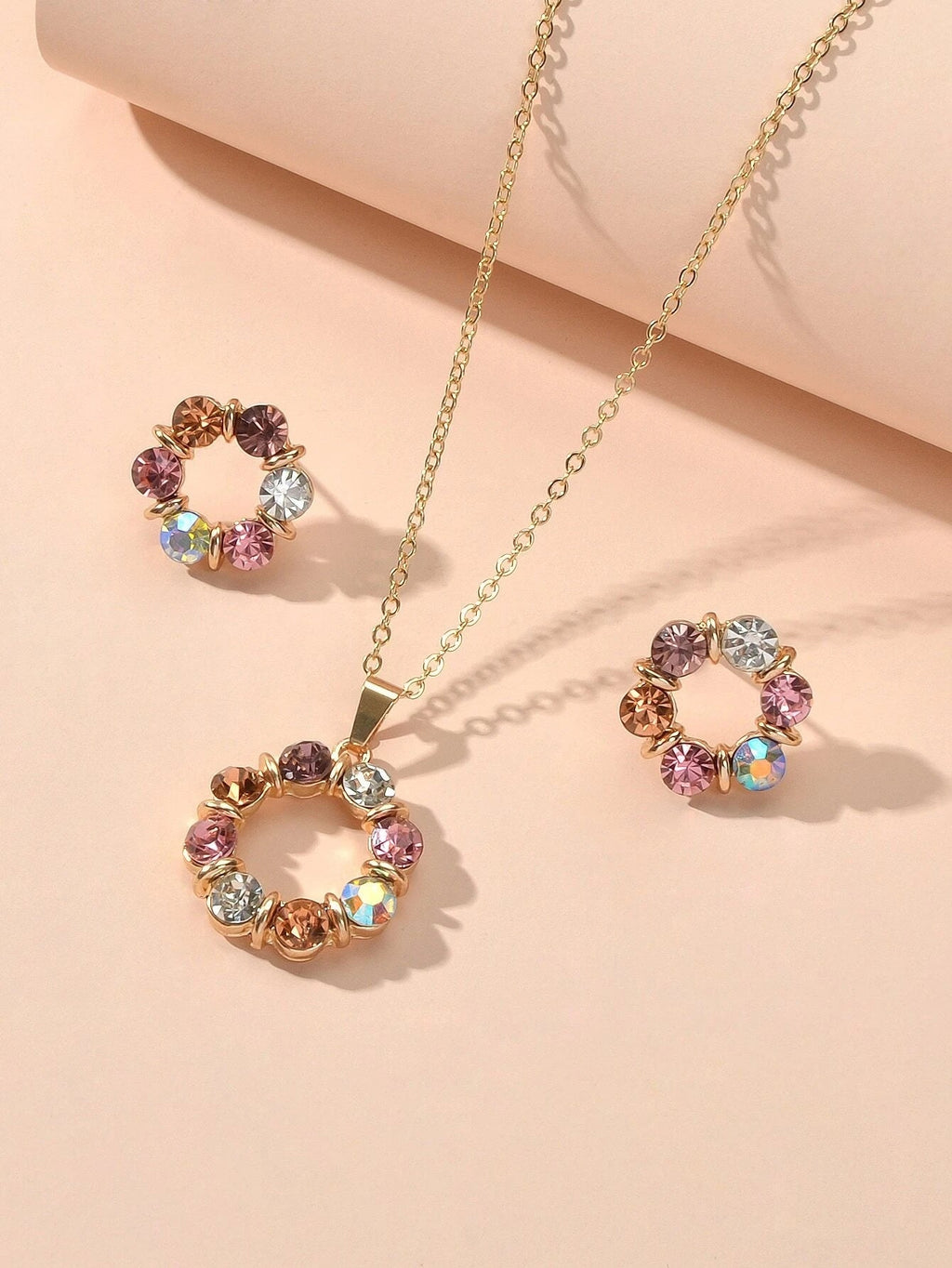 Colourful rhinestone flower jewellery set with an adjustable charm necklace and matching 1.7cm stud earrings