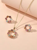 Colourful rhinestone flower jewellery set with an adjustable charm necklace and matching 1.7cm stud earrings