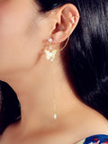 Crystal and pearl butterfly ear cuff with a long dangling chain and cartilage stud