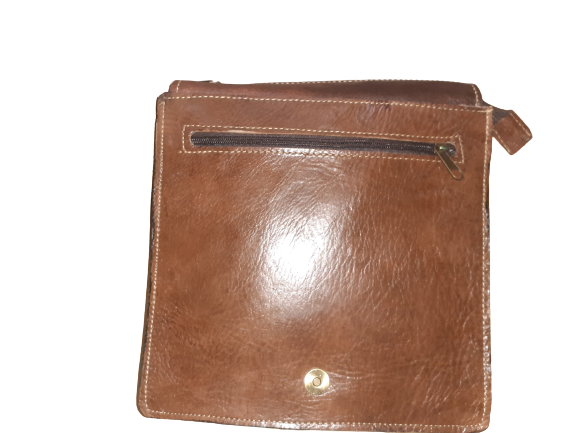 Square rustic cowhide crossbody bag with a carved leather flap and a secure magnetic closure — view 2