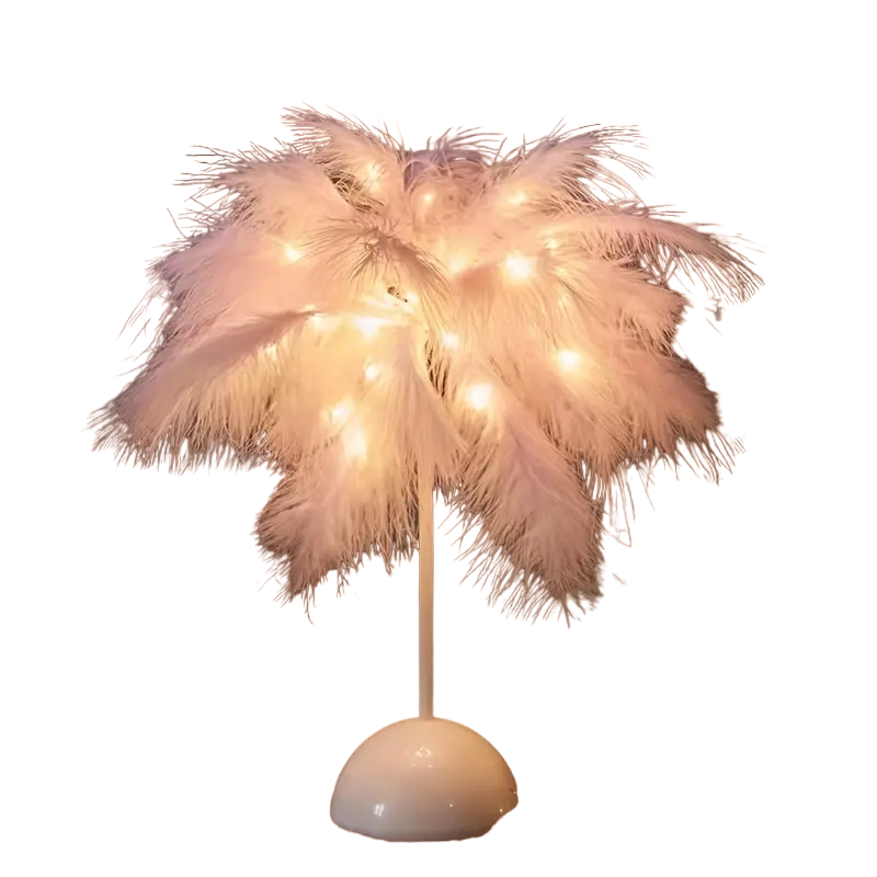 Pink feather touch table lamp emitting a soft cozy glow for bedroom interior decor