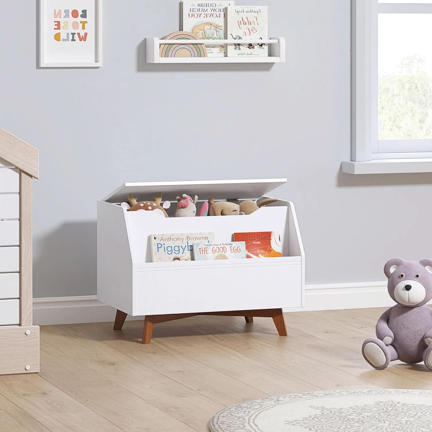 White solid wood toy chest with front-facing book display and slow-closing safety lid. — view 4