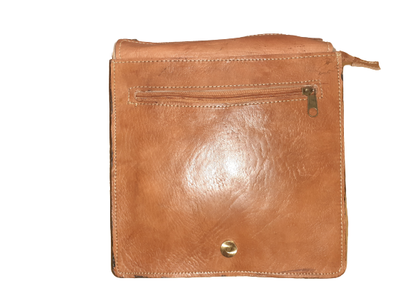 Square rustic cowhide crossbody bag with a carved leather flap and a secure magnetic closure — view 4