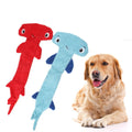 Red and blue hammerhead shark squeaky dog toy made of durable polyester cloth.