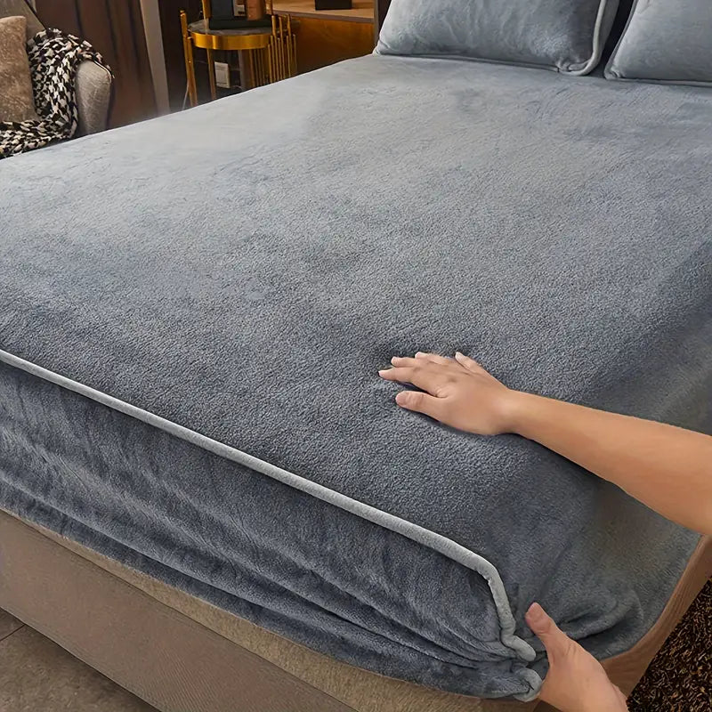 Solid grey milk fleece queen fitted sheet tightly secured on a mattress for comfortable sleeping — view 2